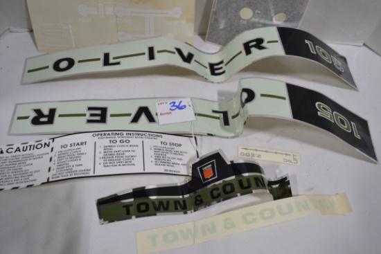 Assortment of Decals including Town & Country, Caution, Oliver, Shift Pattern, Start, and Oliver 105