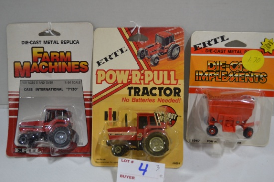 Group of Ertl Farm Machines including 7130 and Pow-R-Pull Tractors and Grain Wagon; 1/64 Scale; NIB
