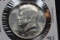 1968-D Kennedy 40% Silver Half Dollar; AU Unc.
