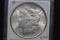 1886 Morgan Silver Dollar; BU Toned Rev.