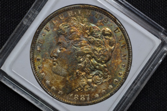 1887 Morgan Silver Dollar; BU and Rainbow Toned