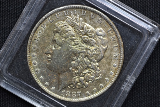 1887 Morgan Silver Dollar; Toned BU (in case)