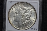 1886 Morgan Silver Dollar; BU Toned Rev.