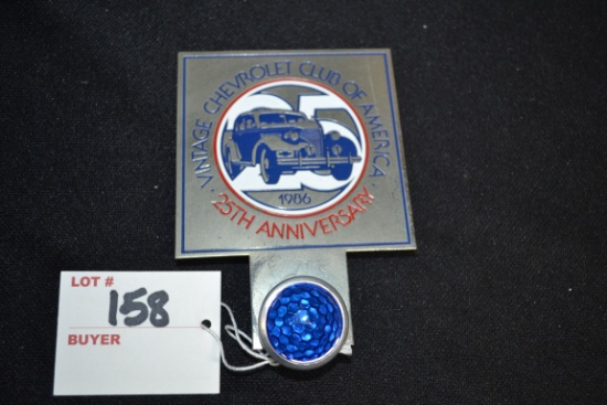 1986 Chevy Club 25th Anniversary License Plate Topper w/Blue Jeweled Reflector; 4"x3"