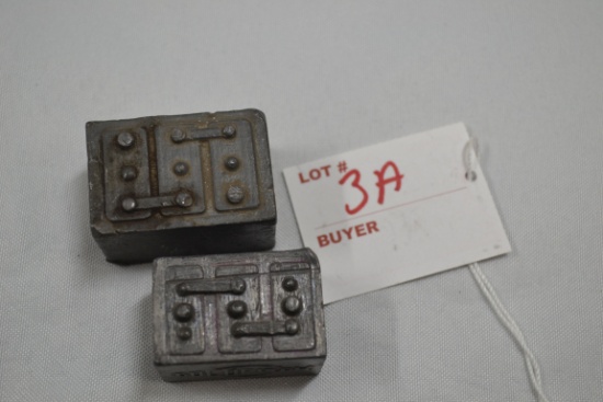 Pair of Metal/Lead? Battery Paper Weights including Goldfisck and Herb Battery and Electric