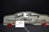 Berl Berry Ford Pressed Metal License Plate Topper w/Red Glass Reflectors