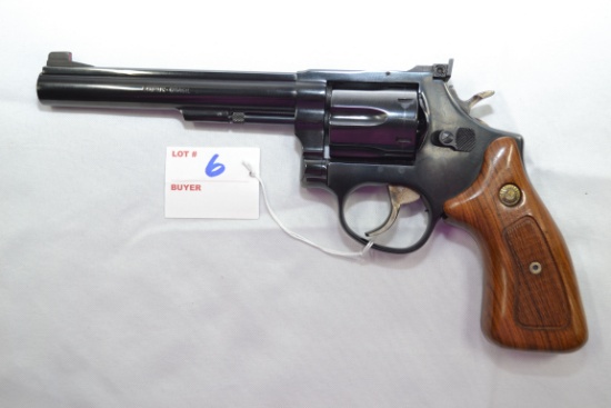 Taurus Model 96 .22 LR Cal. 6-Shot Double Action Revolver w/6" BBL, Adj. Rear Sight, and Hardwood Ch