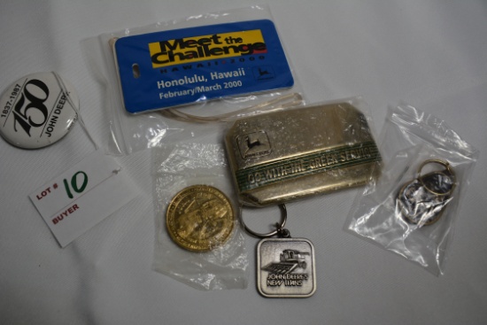 Assortment of John Deere Key Rings, Belt Buckle, Luggage Tag, and Pen