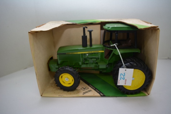 Ertl John Deere MFWD Row-Crop Tractor; NIB; Some staining on box.