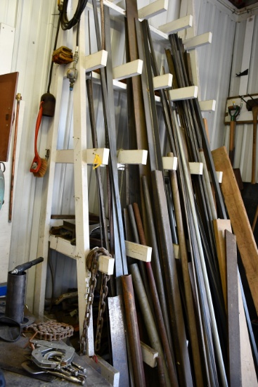 1 Lot of Various New Stock Flat Steel, Angle Steel , Some Square Tubing, and Rounds in Wooden Wall S