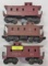 THREE (3) LIONEL O SCALE CABOOSES