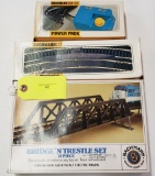 LOT OF THREE (3) BACHMANN HO SCALE ACCESSORIES W/ BRIDGE & TRESTLE, TRACK AND POWER PACK IN BOXES