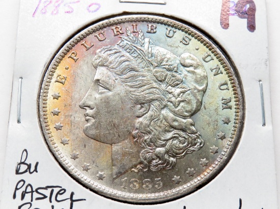 Morgan $ 1885-O BU attractive obv pastel rainbow toning