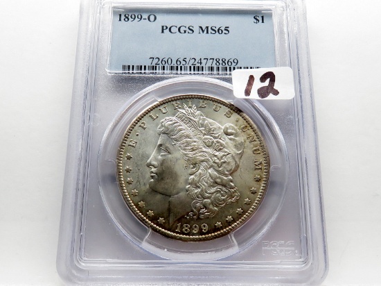 Morgan $ 1899-O PCGS MS65, toning