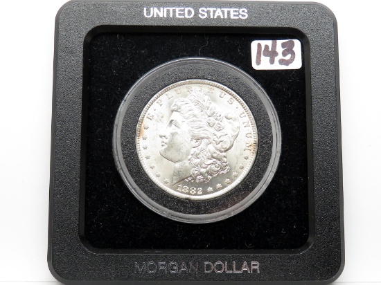 Morgan $ 1882CC Unc in holder, very few marks