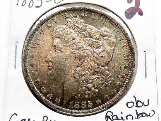 Morgan $ 1885-O Gem BU beautiful obv rainbow toning