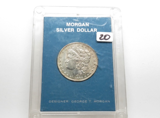 Morgan $ 1904-O AU; Polished ; toned; Capital plastic display