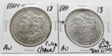 2 Morgan $ 1884-O AU (?Vam Cleaned) & 1889 AU (Rim bump, few tone spots)