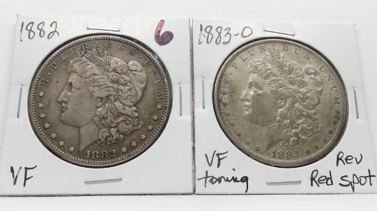 2 Morgan $: 1882 VF, 1883-O VF toning rev red spot