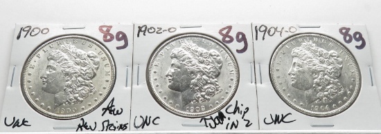 3 Morgan $: 1900 Unc few rev stains, 1902-O Unc (chip in 2), 1904-O Unc
