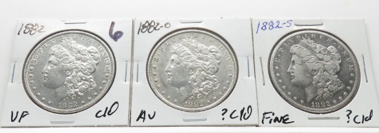 3 Morgan $, ?cleaned: 1882 VF, 1882S F, 1882-O AU