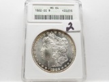 Morgan $ 1882CC ANACS MS64, rim toning older holder, looks PF-Like to us