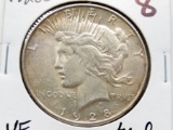 Peace $ 1928S VF toned better date