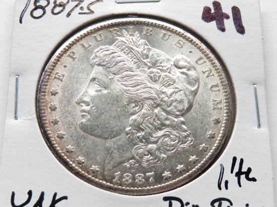 Morgan $ 1887S Unc light rim toning better date