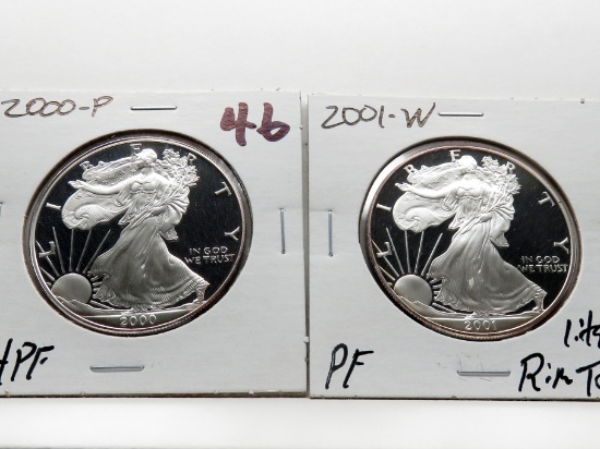 2 Silver American Eagles: 2000P CH PF, 2001W PF light rim toning