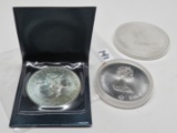 3 Silver Olympic Coins: 2 Canada 1973 ($10, $5) Total ASW Canada 2.217 ASW; 25 Pesos Mexico 1968 (.7