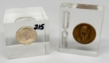 2 JFK Paper Weights: 1 enclosed 1964 Half $, 1 with sand timer