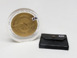 Mix:  1912 folding coin holder; 1978 Pratt & Whitney Aircraft Paper Weight