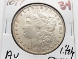 Morgan $ 1899 AU lightly toned better date