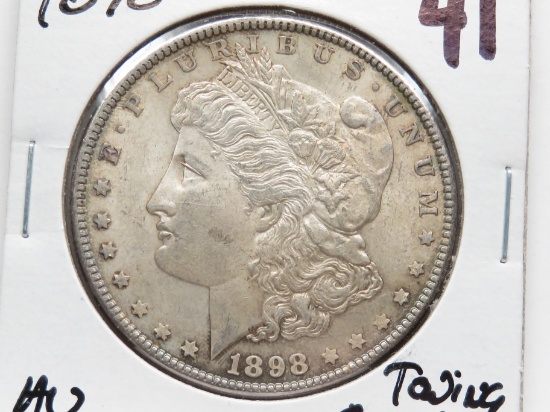 Morgan $ 1898 AU toning, residue