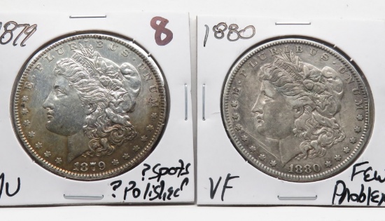2 Morgan $: 1879 AU ?spots ?polished, 1880 VF few problems