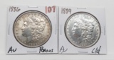 2 Morgan $: 1886 AU porous, 1889 AU cleaned