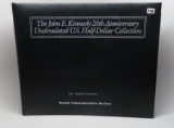 John F Kennedy 25th Anniversary Unc US Half $ Collection by Postal Commemorative Society.  Notebook