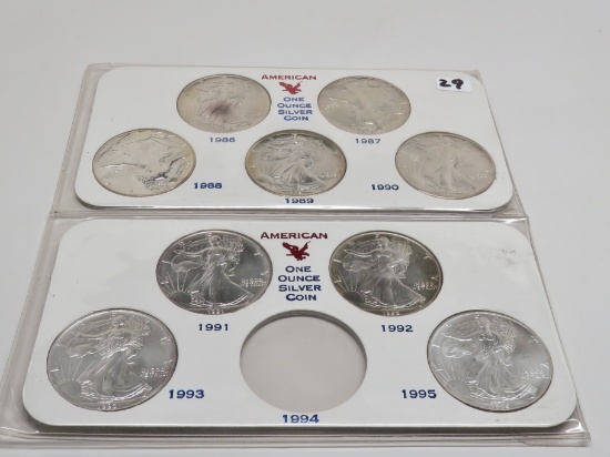 9 Silver American Eagles in holder, Unc-BU small amount toning (1986-1993, 1995)