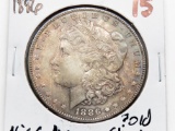 Morgan $ 1886 Nice AU ?old cleaning