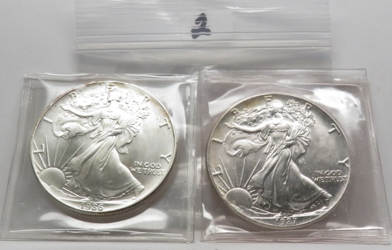 2 Unc Silver American Eagles: 1986, 1987 light toning