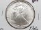 1986 Silver American Eagle BU lightly toned