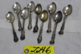 (9) Sterling collector spoons.
