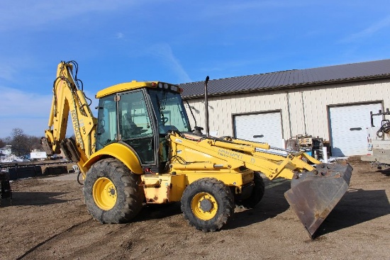 2003 New Holland LB90 backhoe, hrs. on meter 4,970, quicktach, glide ride, 4WD, extenda-hoe, cab, he