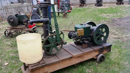 Stover gas engine, 2 hp, with pump jack, on trucks.