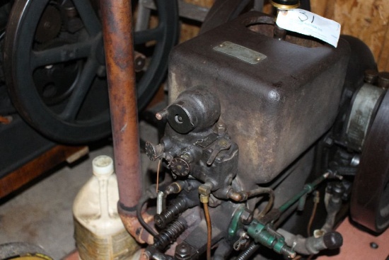 McCormick Deering gas engine, model M, 3 hp, on steel trucks.