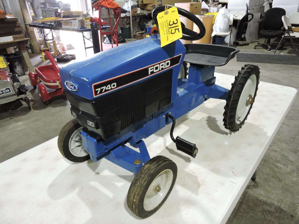 ERTL Ford 7740 pedal tractor, wide front, scale | Proxibid