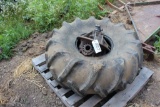 5 T. rear end and 18.4.16.1 tire, both fit trencher.