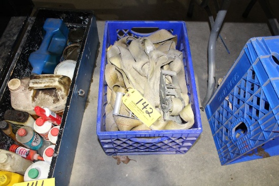 Crate of ratchet straps.
