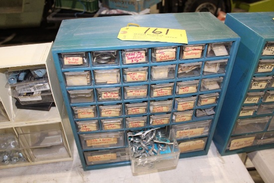 Cabinet with ties, bushings, clips, etc.