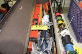 Tool box with levels, saws, pan drills, squaring tools.